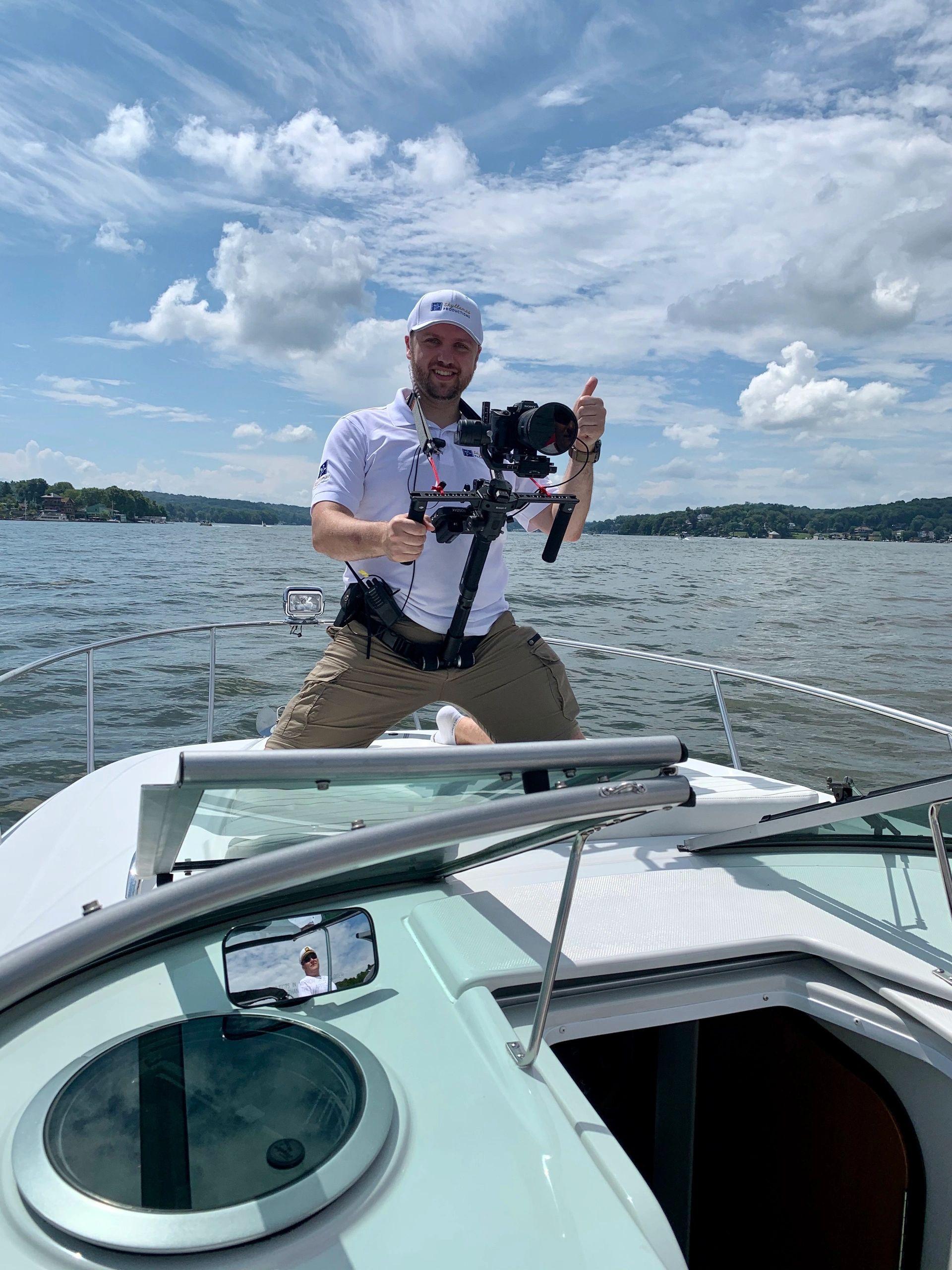 Slawomir Roszak filming from a boat with a gimbal